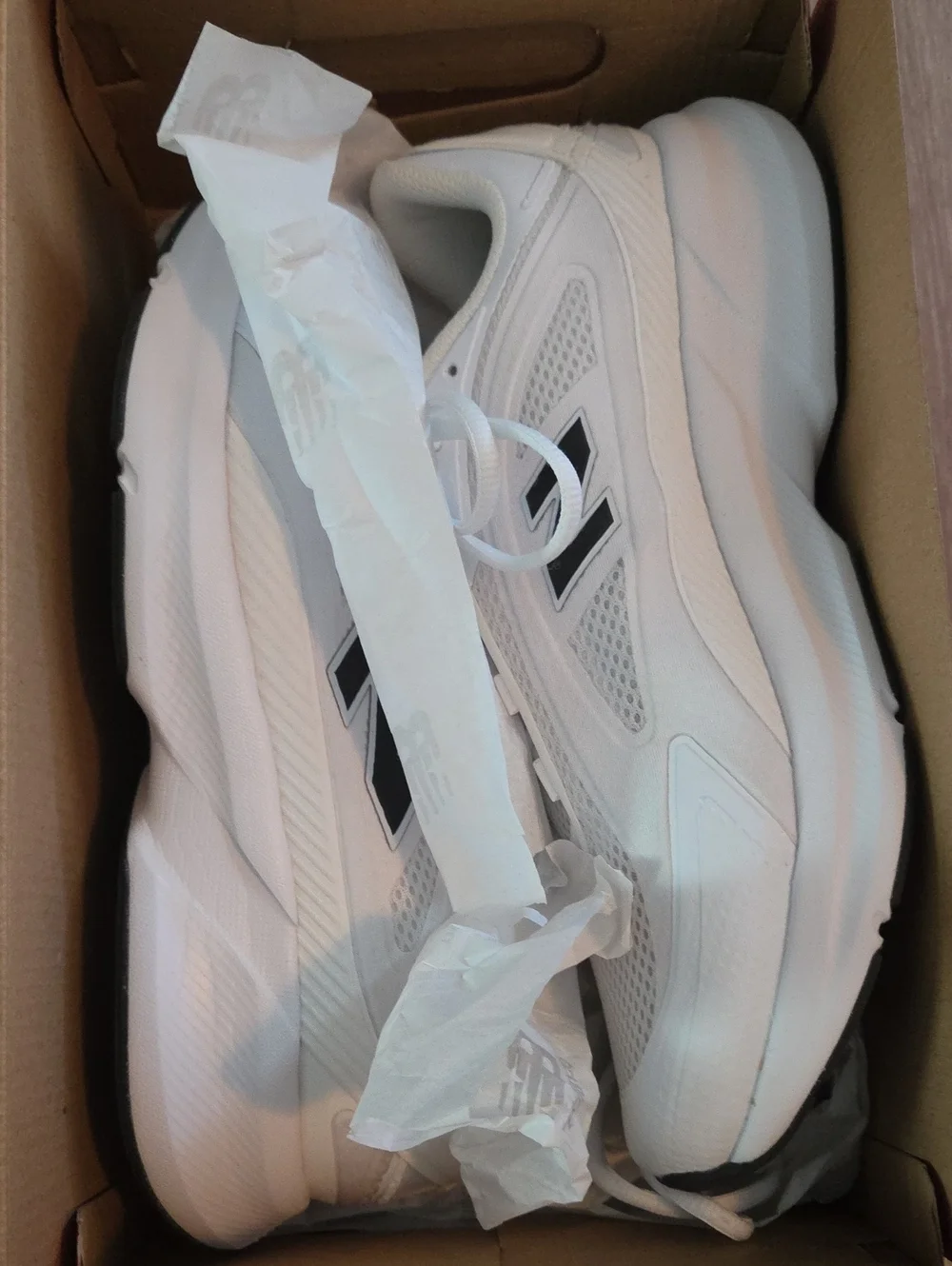New Balance Women's White Sneakers with Black 'N' Accents